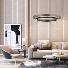 Load image into Gallery viewer, INSPIRA LIFESTYLES – Anello Duo Chandelier – sculptural two-tier chandelier with wood-patterned ring and matte black ring. Modern LED light fixture for dining rooms, living rooms, stairwells, offices, and transitional interiors.
