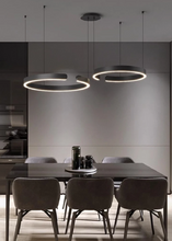 Load image into Gallery viewer, INSPIRA LIFESTYLES – Cuff Circular Pendant, modern ring chandelier in rose gold, gold, black, and white, minimalist circular LED pendant light for dining rooms, conference rooms, double-height spaces, and contemporary interiors
