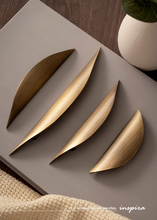 Load image into Gallery viewer, INSPIRA LIFESTYLES – Fin Antique Bronze Handles, curved cabinet pull, sculptural bronze hardware, organic modern cabinet handle, antique bronze drawer pull, designer cabinetry hardware
