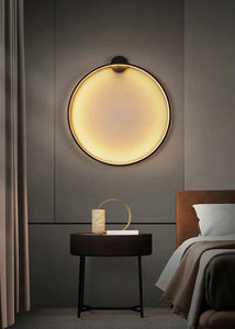 INSPIRA LIFESTYLES – Minimalist Metal Ring Light, a modern circular LED wall light with sleek sculptural design. This versatile wall sconce doubles as accent lighting and wall art, perfect as a bedroom light above a headboard, a living room statement piece, or a minimalist hallway fixture. Contemporary ring light crafted in metal with soft LED illumination, ideal for modern interiors seeking sculptural lighting, circle lights, or functional yet artistic wall sconces.
