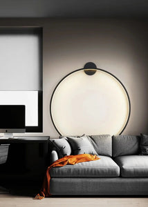 INSPIRA LIFESTYLES – Minimalist Metal Ring Light, a modern circular LED wall light with sleek sculptural design. This versatile wall sconce doubles as accent lighting and wall art, perfect as a bedroom light above a headboard, a living room statement piece, or a minimalist hallway fixture. Contemporary ring light crafted in metal with soft LED illumination, ideal for modern interiors seeking sculptural lighting, circle lights, or functional yet artistic wall sconces.
