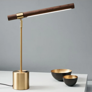 INSPIRA LIFESTYLES – Postaro Table Lamp – modern LED table lamp with postmodern design, featuring a dark wood base and satin brass accents. Sculptural yet functional lighting with a 90-degree adjustable tilt, perfect for bedside tables, home offices, and contemporary workspaces.