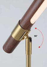 Load image into Gallery viewer, INSPIRA LIFESTYLES – Postaro Table Lamp – modern LED table lamp with postmodern design, featuring a dark wood base and satin brass accents. Sculptural yet functional lighting with a 90-degree adjustable tilt, perfect for bedside tables, home offices, and contemporary workspaces.
