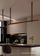 Load image into Gallery viewer, INSPIRA LIFESTYLES – Profilo Bar Pendant, modern linear LED pendant light, leather suspension bar light, long dining table pendant, kitchen island linear lighting, architectural ceiling light
