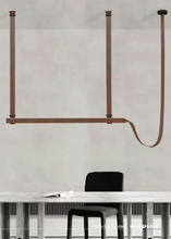 Load image into Gallery viewer, INSPIRA LIFESTYLES – Profilo Bar Pendant, modern linear LED pendant light, leather suspension bar light, long dining table pendant, kitchen island linear lighting, architectural ceiling light
