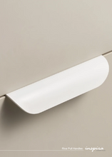 Load image into Gallery viewer, INSPIRA LIFESTYLES - RIVA PULL HANDLES, EDGE PULL HANDLES, SOLID BRASS CABINET HANDLE, MODERN ARC HANDLE, ERGONOMIC CABINET PULL, MINIMAL CABINET HARDWARE, BUILT IN EDGE PULL, KITCHEN DRAWER EDGE HANDLE, ANTIQUE BRONZE CABINET HANDLE, BRUSHED GOLD EDGE PULL, BLACK CABINET HARDWARE, WHITE CABINET HANDLE, ARCHITECTURAL CABINET HARDWARE, CONTEMPORARY MILLWORK HARDWARE, INSPIRA LIFESTYLES
