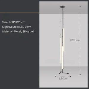 Siliq Sculptural Light with handcrafted silicone forms and metallic segmented cables, single minimalist pendant with glowing silicone tube, dramatic chandelier version of Siliq Light for high ceilings, floor-to-ceiling sculptural lighting installation in modern interior, flexible silicone light tubes emitting soft ambient glow, artistic designer light fixture styled in dining room, contemporary sculptural lighting as statement piece in commercial space.
