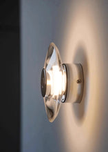 Load image into Gallery viewer, Inspira Lifestyles | Onda Crystal Wall Light with round optical crystal disc and chrome center, mounted as a modern LED wall or ceiling sconce.
