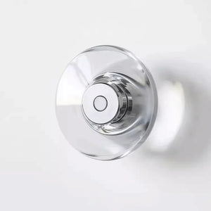 Inspira Lifestyles | Onda Crystal Wall Light with round optical crystal disc and chrome center, mounted as a modern LED wall or ceiling sconce.