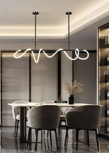 Load image into Gallery viewer, INSPIRA LIFESTYLES | Linear Rope Chandelier - Modern dining room with a stylish pendant light fixture.
