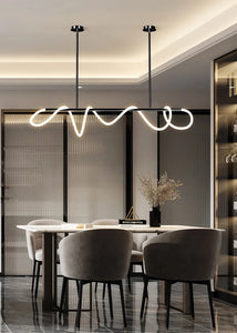 INSPIRA LIFESTYLES | Linear Rope Chandelier - Modern dining room with a stylish pendant light fixture.