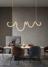 Load image into Gallery viewer, INSPIRA LIFESTYLES | Linear Rope Chandelier - Modern dining room with a stylish pendant light fixture.
