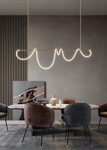 INSPIRA LIFESTYLES | Linear Rope Chandelier - Modern dining room with a stylish pendant light fixture.