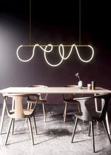 Load image into Gallery viewer, INSPIRA LIFESTYLES | Linear Rope Chandelier - Modern dining area with a unique pendant light fixture.
