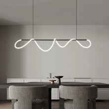 Load image into Gallery viewer, INSPIRA LIFESTYLES | Linear Rope Chandelier - Modern dining area with a unique pendant light fixture.
