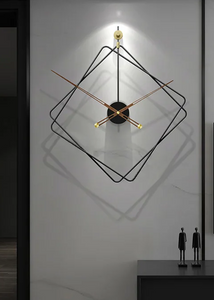 Oversized Thierry Wall Clock with minimalist iron frame and wooden arms, sculptural geometric wall clock as statement decor, modern wall clock styled in living room, large decorative wall clock in entryway, close-up of wooden hands on Thierry Wall Clock, contemporary geometric clock on neutral wall. Modern wall clock with geometric design on a white wall