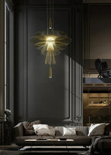 Load image into Gallery viewer, INSPIRA LIFESTYLES - Veret Modern Chandelier – sculptural wire pendant light with tiered fan-shaped rods. A striking abstract lighting fixture ideal for living rooms, dining areas, hotels, and restaurants. Modern chandelier, stair light, accent light, and iron pendant lighting all in one elegant design.
