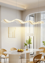 Load image into Gallery viewer, INSPIRA LIFESTYLES - Wave Modern Chandelier, ribbon-inspired chandelier, linear LED chandelier, dining room chandelier, kitchen island pendant light, sculptural architectural lighting
