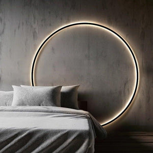 INSPIRA LIFESTYLES – Minimalist Metal Ring Light, a modern circular LED wall light with sleek sculptural design. This versatile wall sconce doubles as accent lighting and wall art, perfect as a bedroom light above a headboard, a living room statement piece, or a minimalist hallway fixture. Contemporary ring light crafted in metal with soft LED illumination, ideal for modern interiors seeking sculptural lighting, circle lights, or functional yet artistic wall sconces.