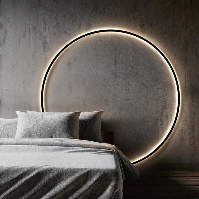 INSPIRA LIFESTYLES – Minimalist Metal Ring Light, a modern circular LED wall light with sleek sculptural design. This versatile wall sconce doubles as accent lighting and wall art, perfect as a bedroom light above a headboard, a living room statement piece, or a minimalist hallway fixture. Contemporary ring light crafted in metal with soft LED illumination, ideal for modern interiors seeking sculptural lighting, circle lights, or functional yet artistic wall sconces.