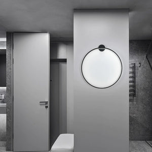 INSPIRA LIFESTYLES – Minimalist Metal Ring Light, a modern circular LED wall light with sleek sculptural design. This versatile wall sconce doubles as accent lighting and wall art, perfect as a bedroom light above a headboard, a living room statement piece, or a minimalist hallway fixture. Contemporary ring light crafted in metal with soft LED illumination, ideal for modern interiors seeking sculptural lighting, circle lights, or functional yet artistic wall sconces.