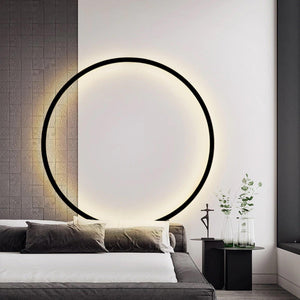 INSPIRA LIFESTYLES – Minimalist Metal Ring Light, a modern circular LED wall light with sleek sculptural design. This versatile wall sconce doubles as accent lighting and wall art, perfect as a bedroom light above a headboard, a living room statement piece, or a minimalist hallway fixture. Contemporary ring light crafted in metal with soft LED illumination, ideal for modern interiors seeking sculptural lighting, circle lights, or functional yet artistic wall sconces.