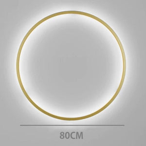 INSPIRA LIFESTYLES – Minimalist Metal Ring Light, a modern circular LED wall light with sleek sculptural design. This versatile wall sconce doubles as accent lighting and wall art, perfect as a bedroom light above a headboard, a living room statement piece, or a minimalist hallway fixture. Contemporary ring light crafted in metal with soft LED illumination, ideal for modern interiors seeking sculptural lighting, circle lights, or functional yet artistic wall sconces.