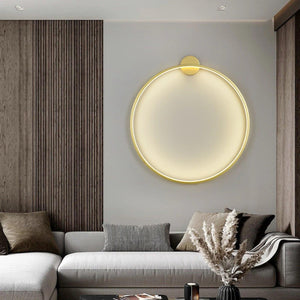 INSPIRA LIFESTYLES – Minimalist Metal Ring Light, a modern circular LED wall light with sleek sculptural design. This versatile wall sconce doubles as accent lighting and wall art, perfect as a bedroom light above a headboard, a living room statement piece, or a minimalist hallway fixture. Contemporary ring light crafted in metal with soft LED illumination, ideal for modern interiors seeking sculptural lighting, circle lights, or functional yet artistic wall sconces.