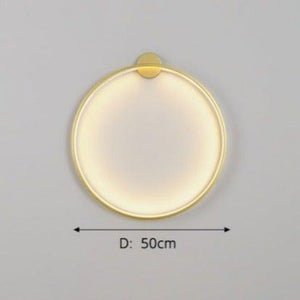 INSPIRA LIFESTYLES – Minimalist Metal Ring Light, a modern circular LED wall light with sleek sculptural design. This versatile wall sconce doubles as accent lighting and wall art, perfect as a bedroom light above a headboard, a living room statement piece, or a minimalist hallway fixture. Contemporary ring light crafted in metal with soft LED illumination, ideal for modern interiors seeking sculptural lighting, circle lights, or functional yet artistic wall sconces.