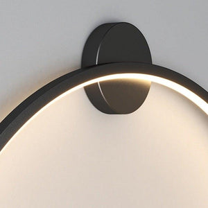 INSPIRA LIFESTYLES – Minimalist Metal Ring Light, a modern circular LED wall light with sleek sculptural design. This versatile wall sconce doubles as accent lighting and wall art, perfect as a bedroom light above a headboard, a living room statement piece, or a minimalist hallway fixture. Contemporary ring light crafted in metal with soft LED illumination, ideal for modern interiors seeking sculptural lighting, circle lights, or functional yet artistic wall sconces.