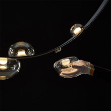 Load image into Gallery viewer, INSPIRA LIFESTYLES - Strapped Chandelier - ABSTRACT LIGHT, ACCENT LIGHT, BEDROOM LIGHT, BOARDROOM LIGHT, CHANDELIER, DINING LIGHT, FEATURE LIGHT, GLASS GLOBE CHANDELIER, GLOBE CHANDELIER, GLOBE LIGHT, HANGING LIGHT, HOTEL LIGHT, LEATHER STRAP LIGHT, LED CHANDELIER, LED LIGHT, LIGHT, LIGHT FIXTURE, LIGHTING, LIGHTS, LIVING ROOM LIGHT, MINIMAL LIGHT FIXTURE, MINIMALIST CHANDELIER, MINIMALIST LIGHT, MODERN CHANDELIER, MODERN LIGHT, MODERN PENDANT LIGHT, PENDANT LIGHT, RESTAURANT LIGHT, SCULPTURAL LIGHT
